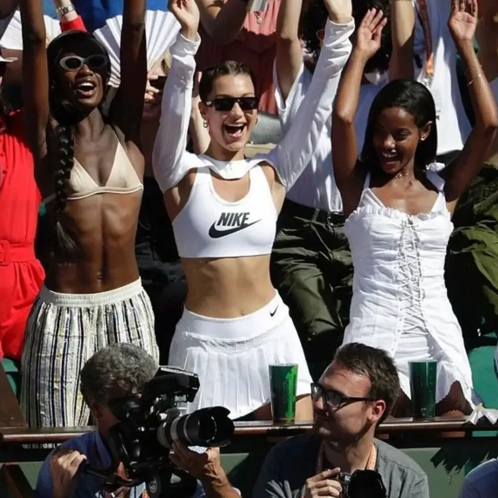 Nike White Crop Top and White Pleated Mini Skirt with Black Accents
